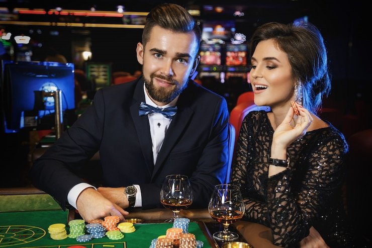 slotvip login Free Bet Blackjack dealer in live studio with multi-angle camera feed showing card dealing and chip collection